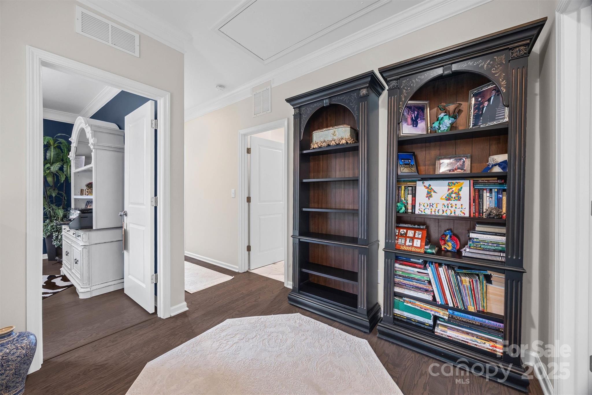 632 Amber Meadows Way Tega Cay, SC 29708 - Photo 20 of 48 a view of bedroom with furniture and closet