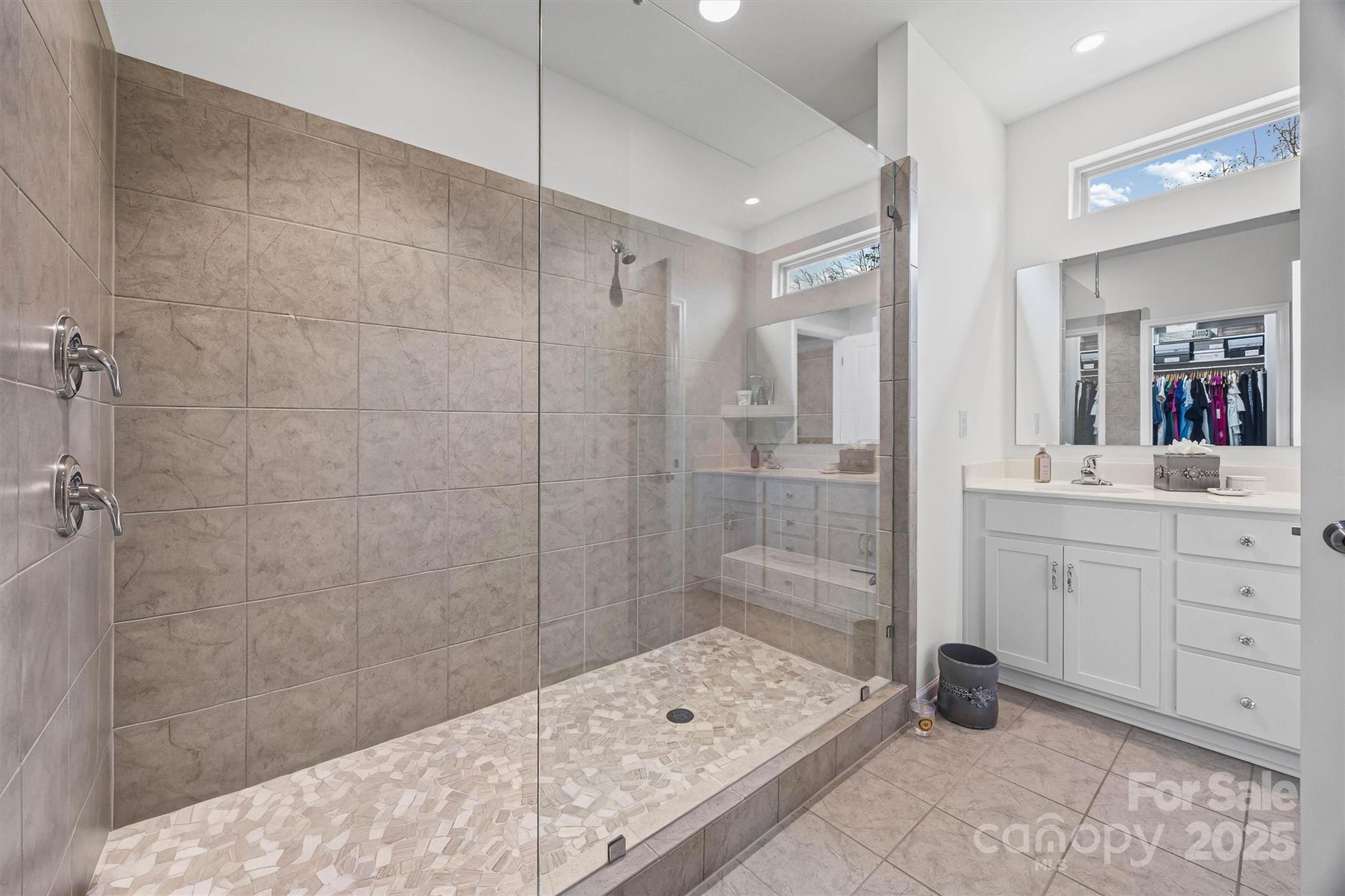 632 Amber Meadows Way Tega Cay, SC 29708 - Photo 24 of 48 a bathroom with a sink shower and a mirror