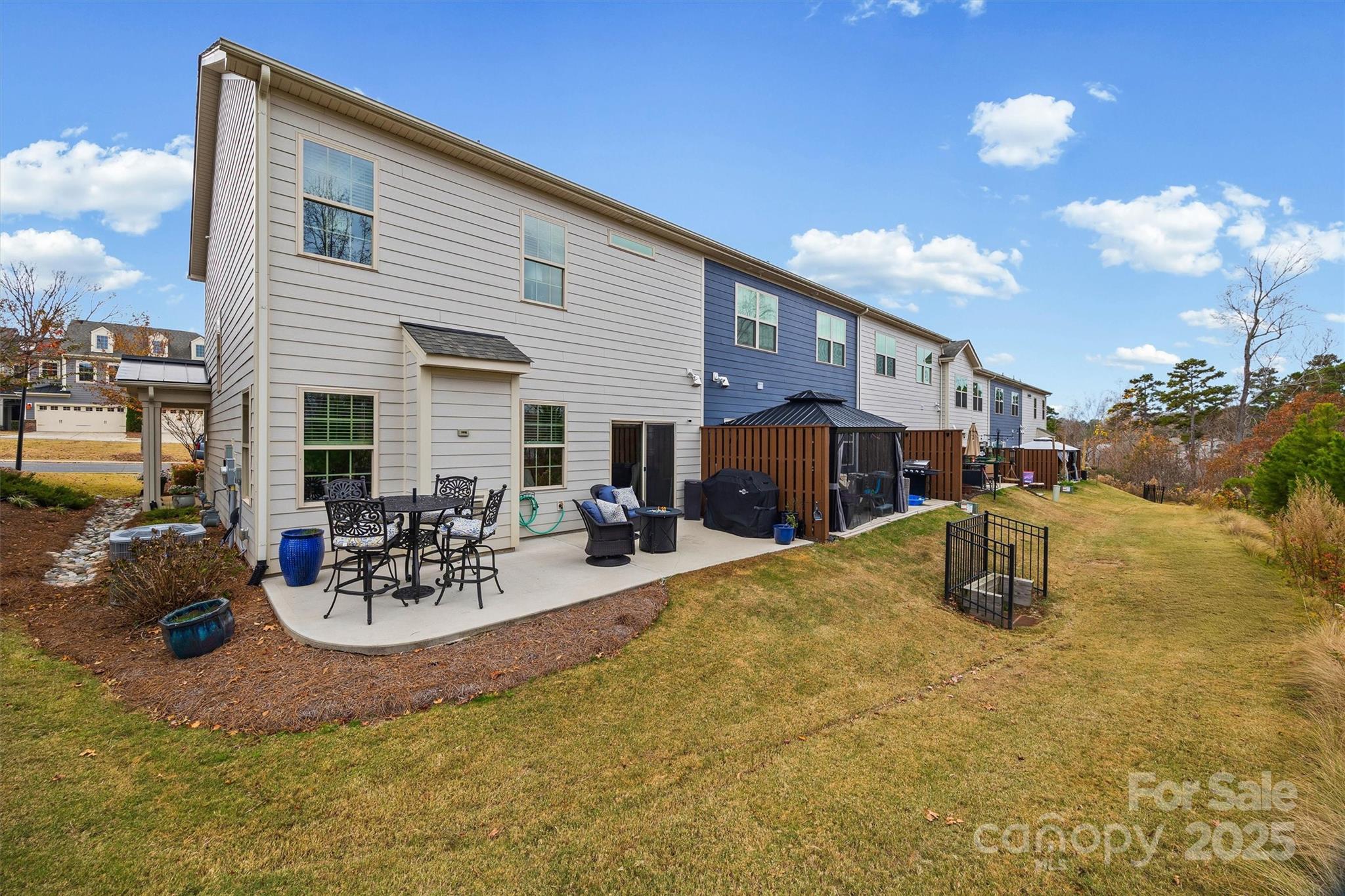 632 Amber Meadows Way Tega Cay, SC 29708 - Photo 34 of 48 a view of a patio with swimming pool