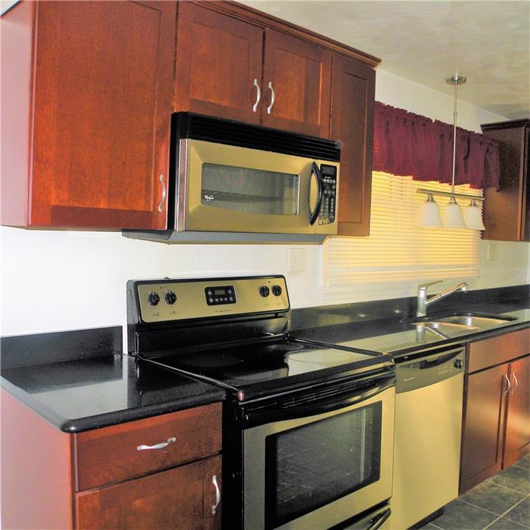 664 Donohoe Road Latrobe, PA 15650 - Photo 3 of 25 Cherry Cabinets with Granite Countertops
