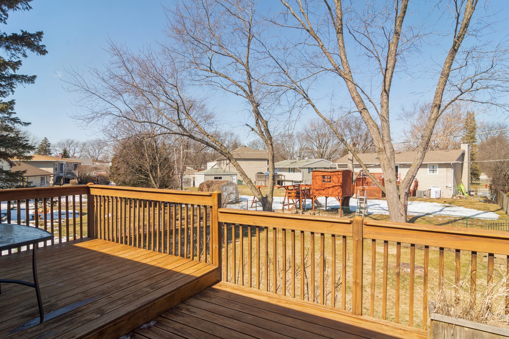350 Hawthorne Road Buffalo Grove, IL 60089 - Photo 14 of 15 a view of a deck with wooden floor and fence