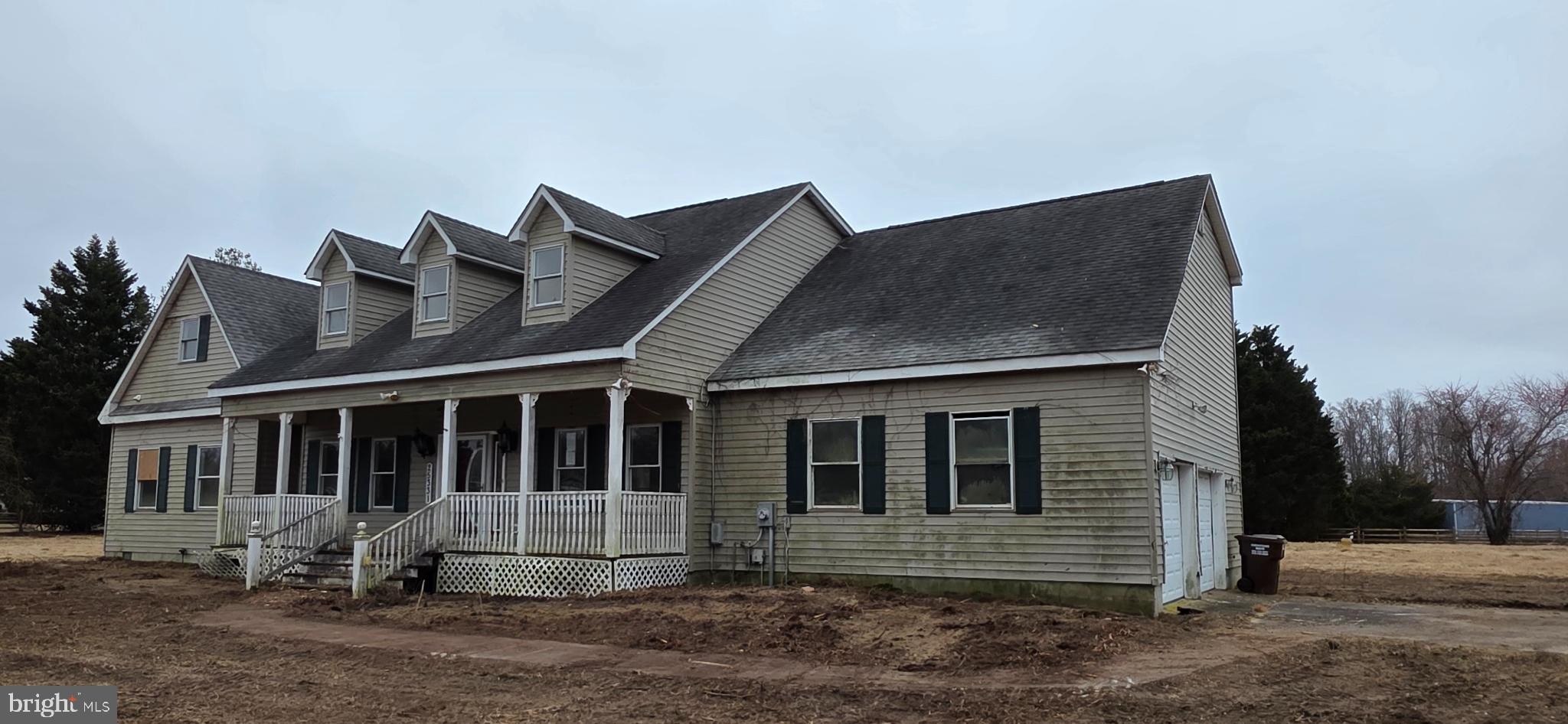 a front view of a house with yard