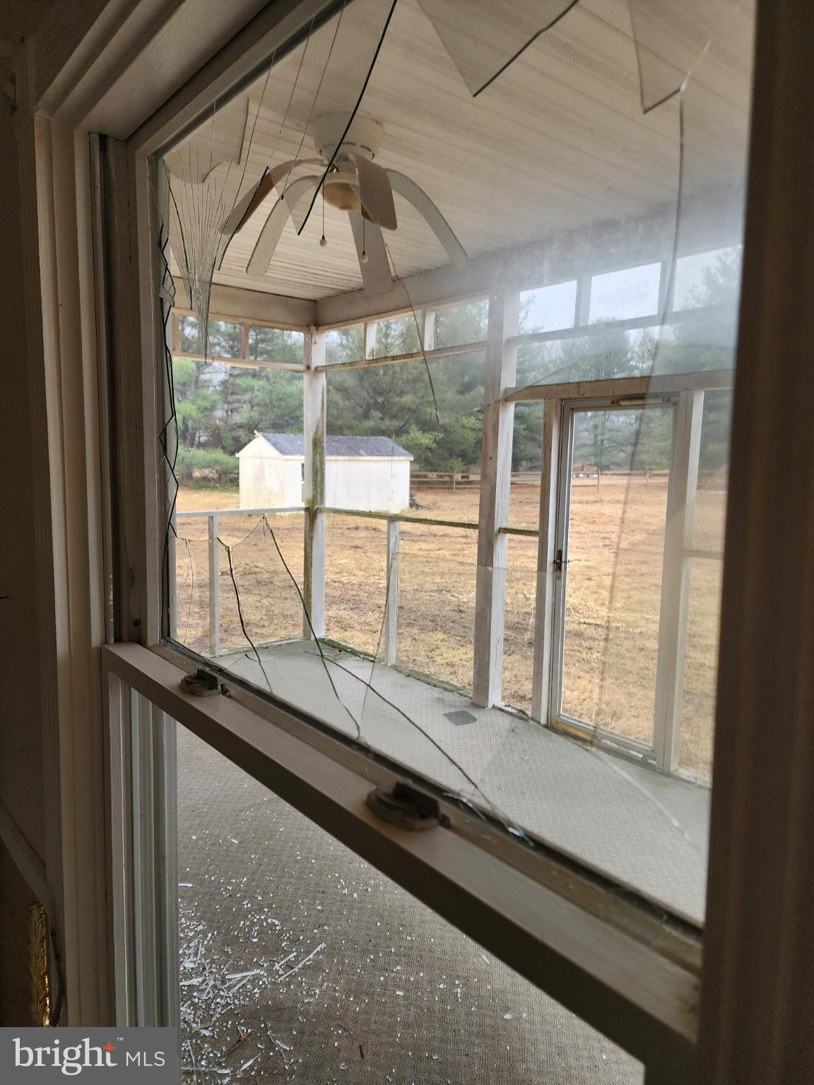 25331 Adams Landing Road Denton, MD 21629 - Photo 13 of 39 a view of an empty room with a window
