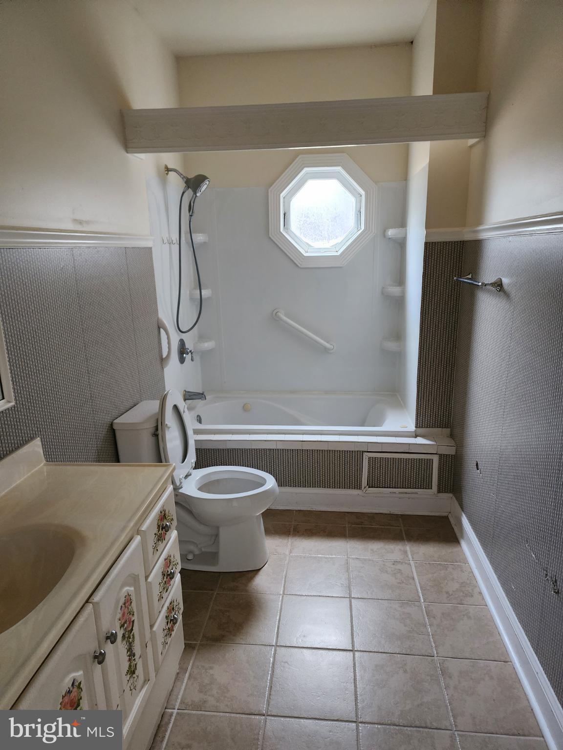 25331 Adams Landing Road Denton, MD 21629 - Photo 15 of 39 a bathroom with a sink a toilet and shower