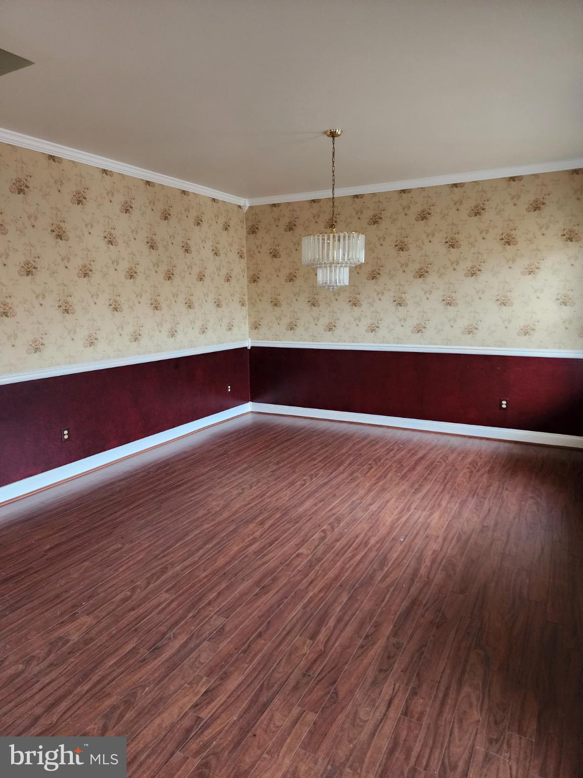 25331 Adams Landing Road Denton, MD 21629 - Photo 3 of 39 a view of wooden floor and a window in the room