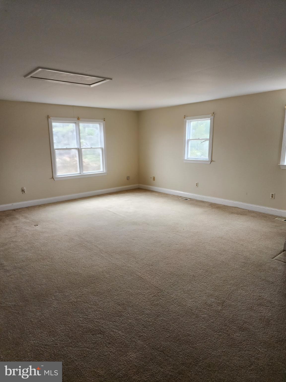 25331 Adams Landing Road Denton, MD 21629 - Photo 36 of 39 an empty room with a empty space and windows