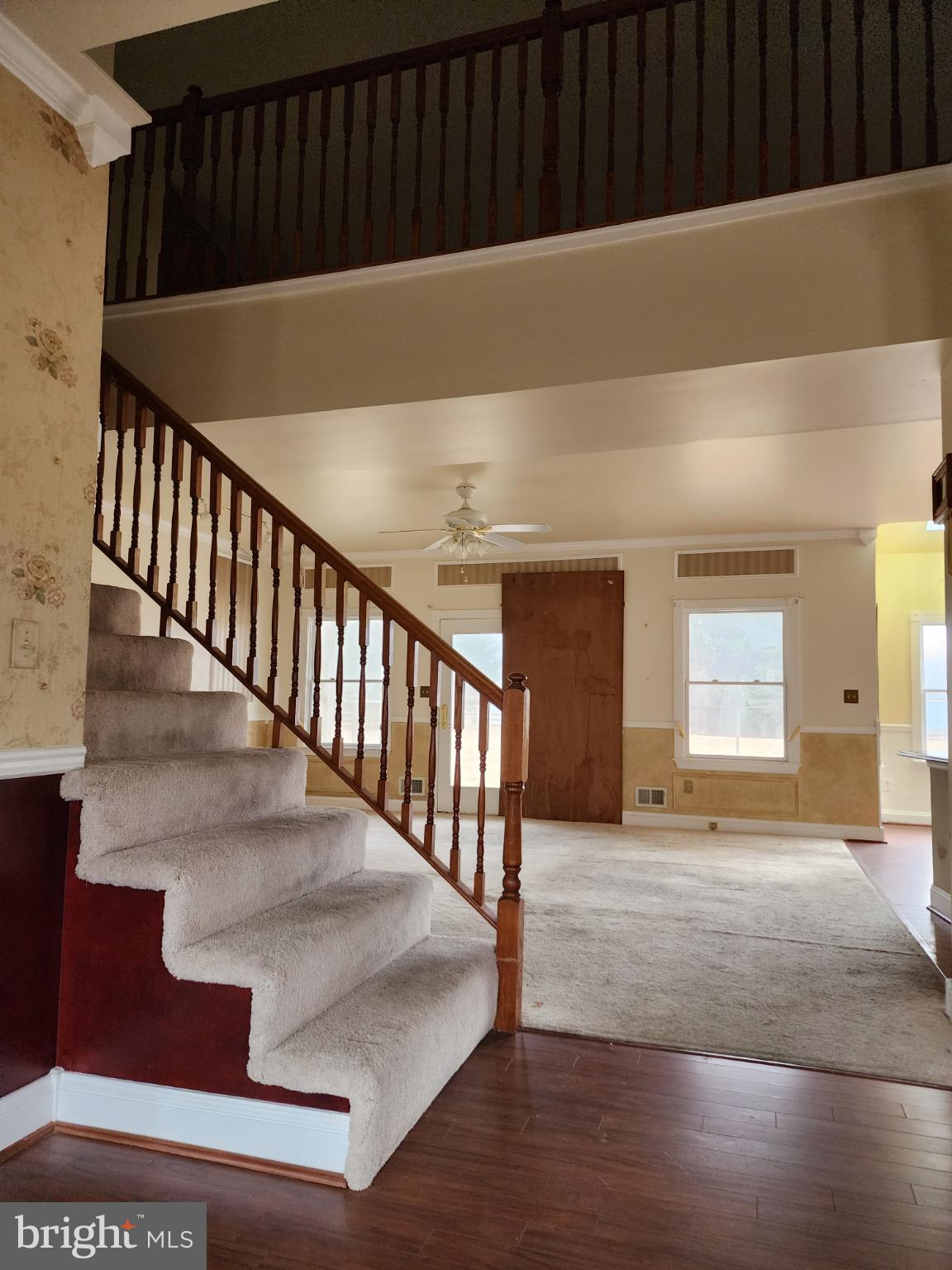 25331 Adams Landing Road Denton, MD 21629 - Photo 38 of 39 a view of staircase with white walls door