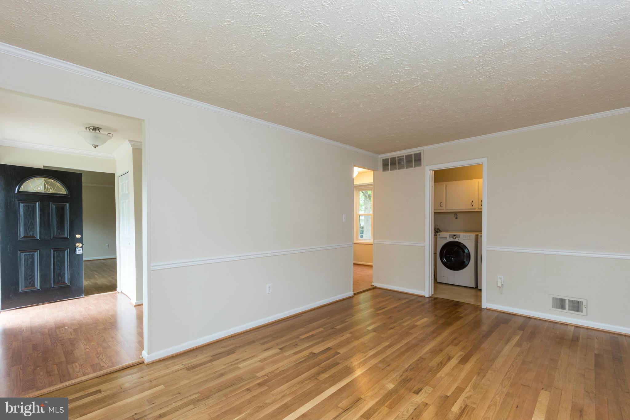 16107 Kent Road Laurel, MD 20707 - Photo 11 of 28 Family Room off foyer & kitchen w/hardwood floors