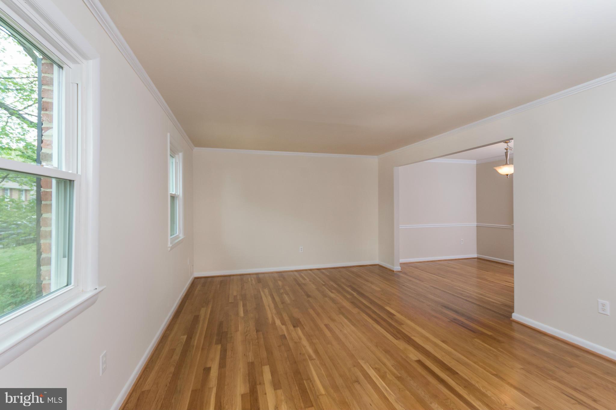 16107 Kent Road Laurel, MD 20707 - Photo 4 of 28 Spacious living room with hardwood floor