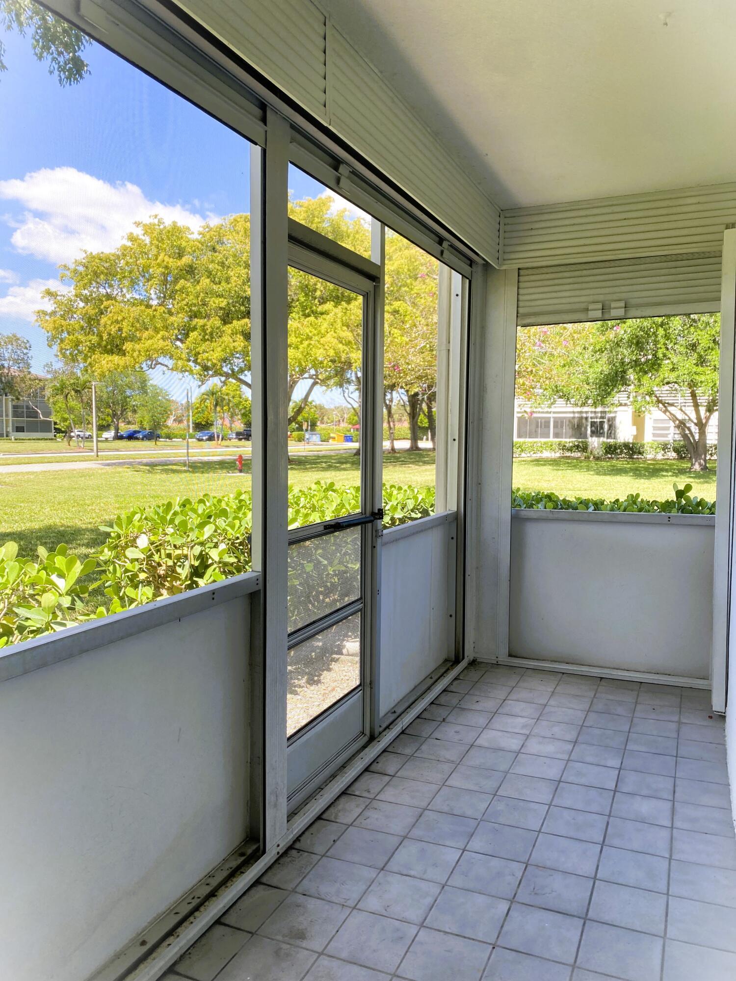256 Mansfield F, Unit G Boca Raton, FL 33434 - Photo 17 of 40 TILED PATIO