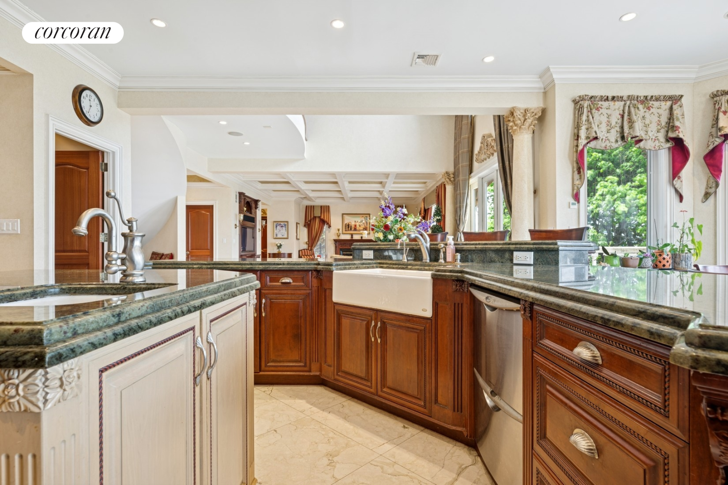 1-15 Samos Lane Queens, NY 11357 - Photo 13 of 32 a kitchen with stainless steel appliances granite countertop a sink and wooden cabinets