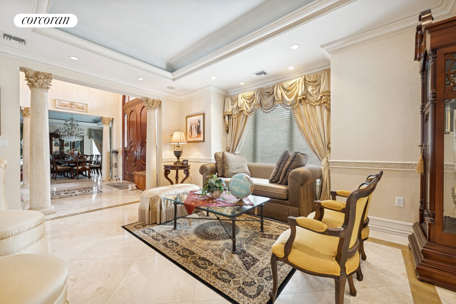 1-15 Samos Lane Queens, NY 11357 - Photo 14 of 32 a dining room with furniture and a floor to ceiling window