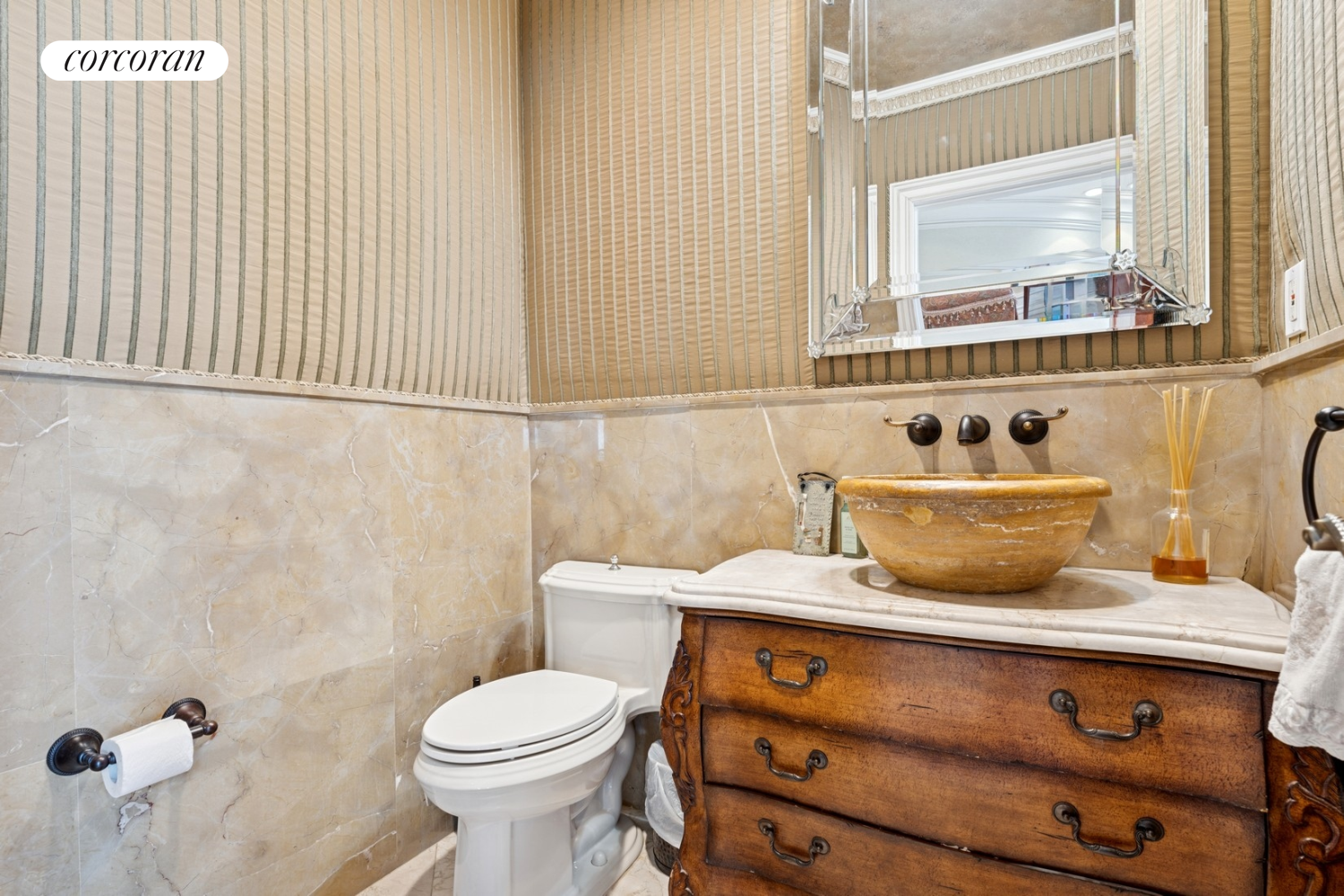 1-15 Samos Lane Queens, NY 11357 - Photo 15 of 32 a bathroom with a sink a toilet and a mirror