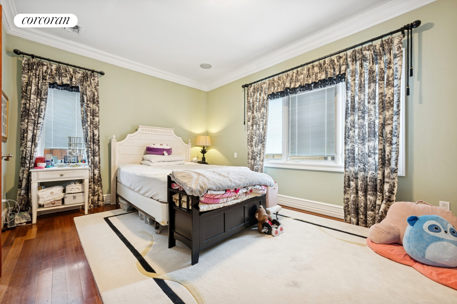 1-15 Samos Lane Queens, NY 11357 - Photo 19 of 32 a bedroom with a bed and a window