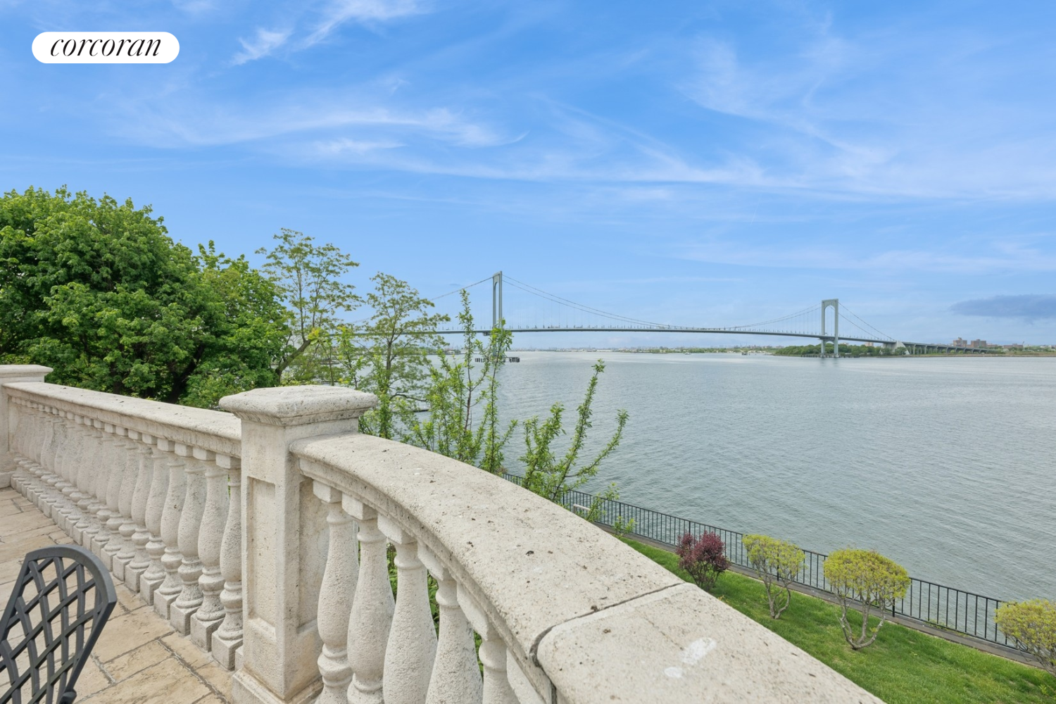 1-15 Samos Lane Queens, NY 11357 - Photo 25 of 32 a view of a lake with a mountain in the background