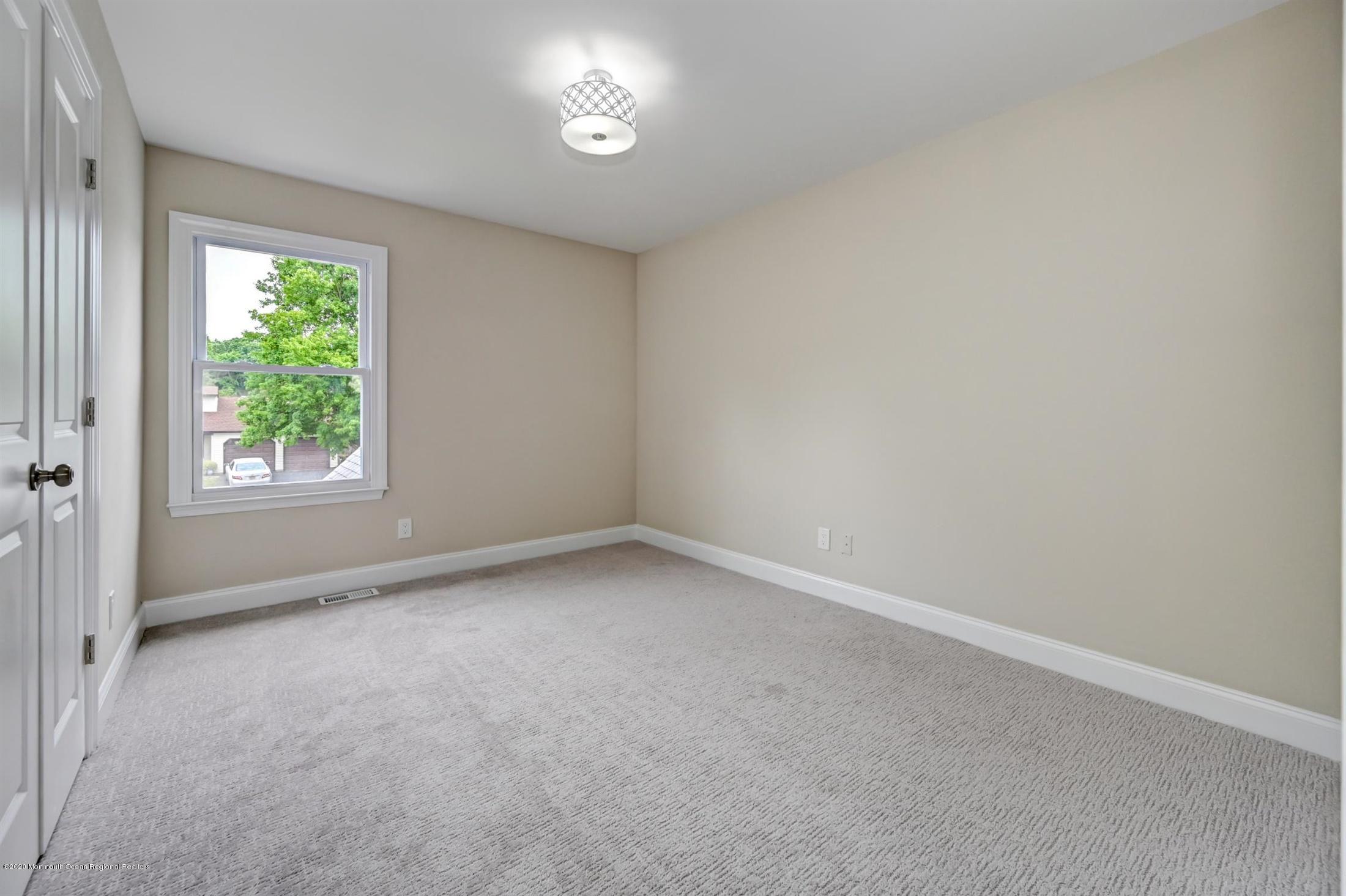 11 Rita Drive Howell, NJ 07731 - Photo 19 of 26 an empty room with a window
