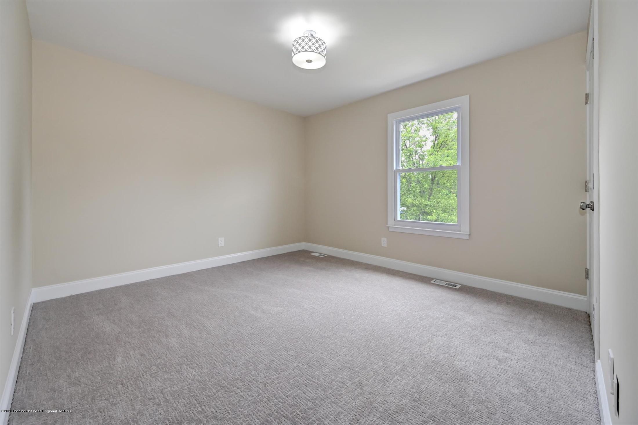 11 Rita Drive Howell, NJ 07731 - Photo 20 of 26 an empty room with a window