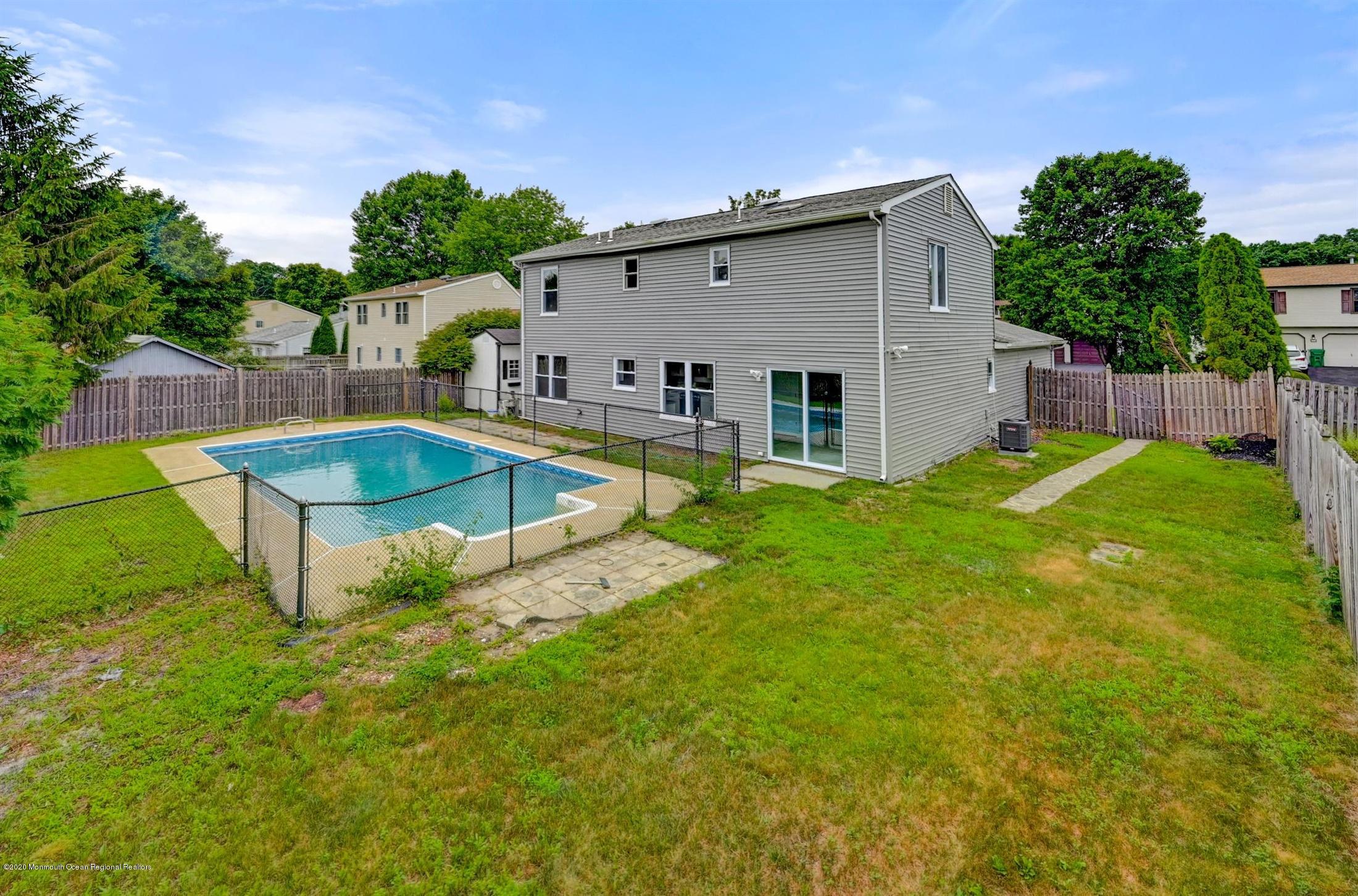11 Rita Drive Howell, NJ 07731 - Photo 25 of 26 a view of a house with pool and a yard