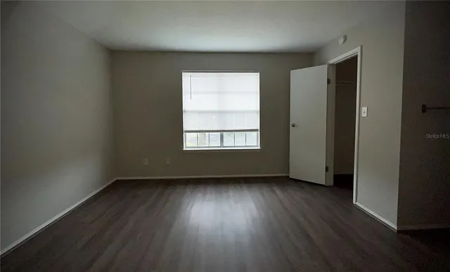 a bathroom with a double vanity sink and mirror