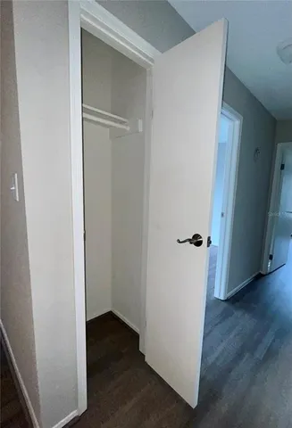 a bathroom with a sink shower and a mirror