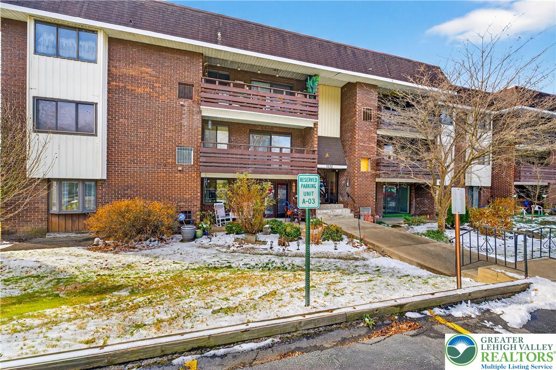 1575 Creekside Road, Unit A2 Whitehall, PA 18052 - Photo 1 of 26 a view of a building with street