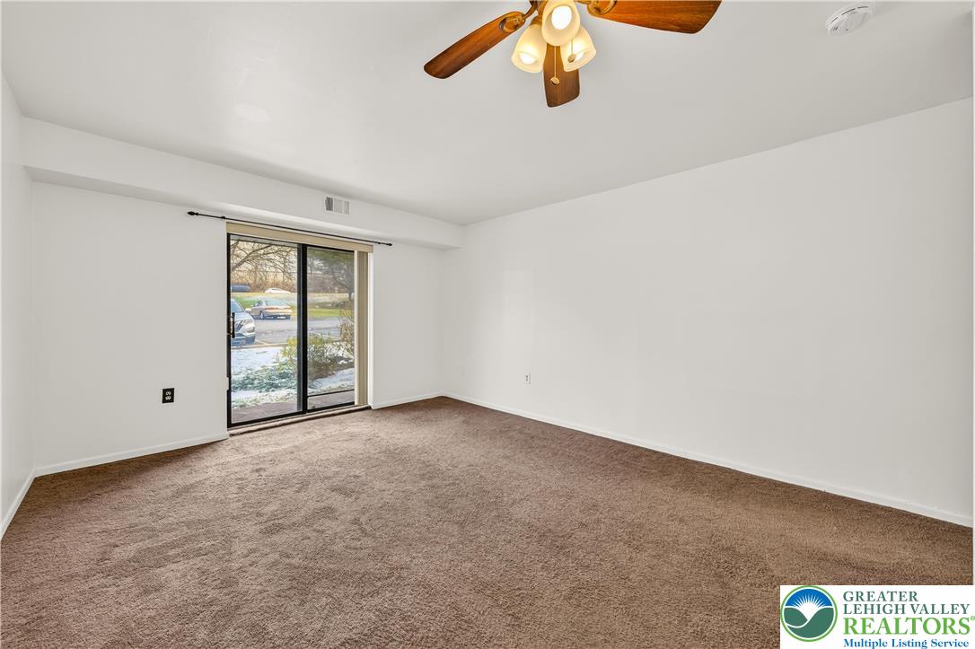 1575 Creekside Road, Unit A2 Whitehall, PA 18052 - Photo 20 of 26 an empty room with a window