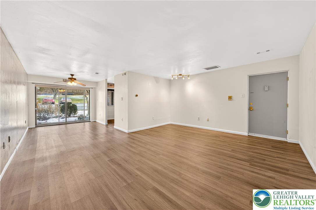 1575 Creekside Road, Unit A2 Whitehall, PA 18052 - Photo 8 of 26 a view of empty room with wooden floor
