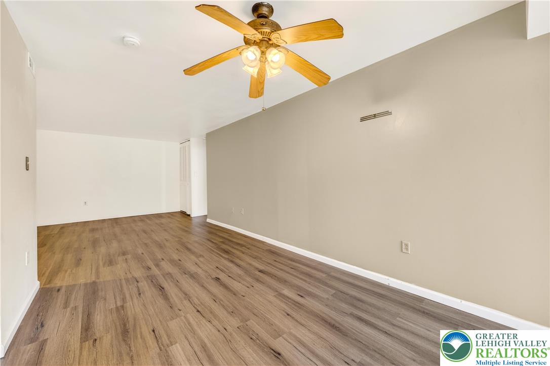 1575 Creekside Road, Unit A2 Whitehall, PA 18052 - Photo 9 of 26 a view of empty room with wooden floor