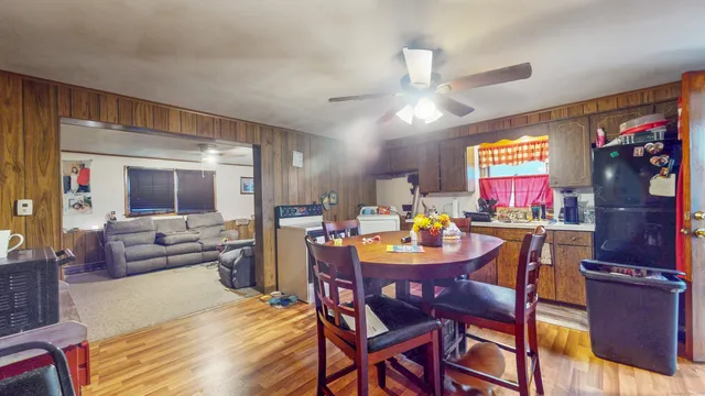 a view of a dining room with furniture