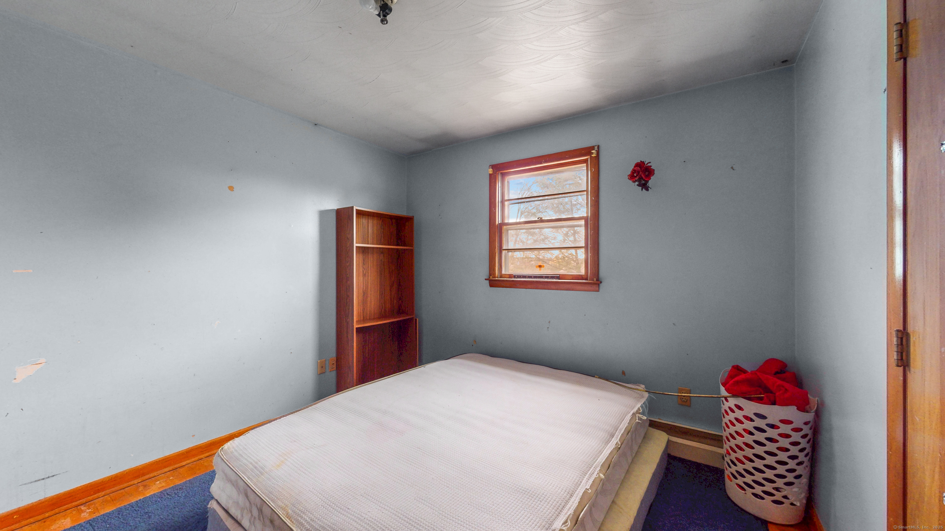 62 Rosemount Avenue Waterbury, CT 06708 - Photo 10 of 20 a bedroom with bed and a window