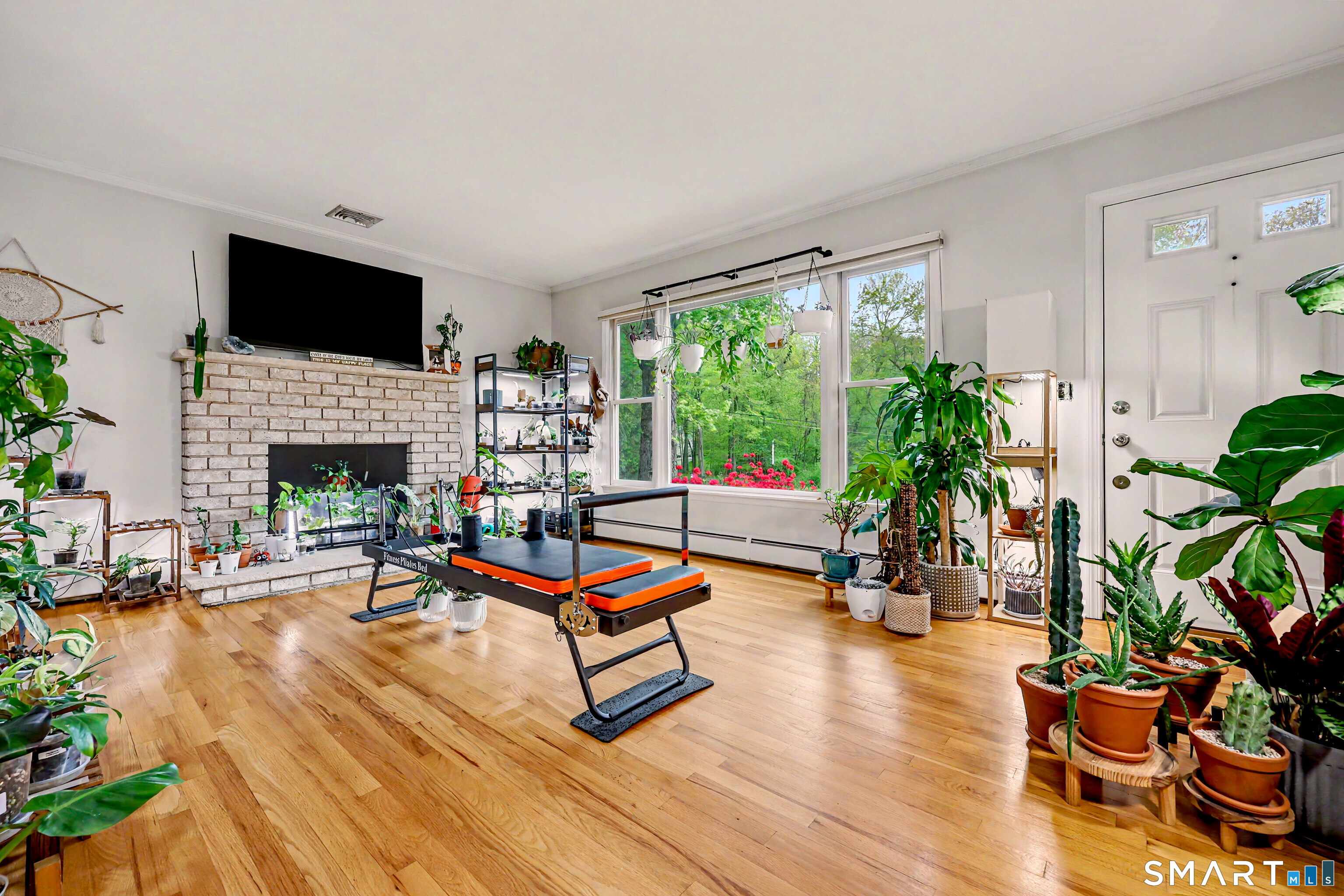 46 Todds Road Ridgefield, CT 06877 - Photo 18 of 35 Living room, currently repurposed as solarium, bright, spacious and welcoming.