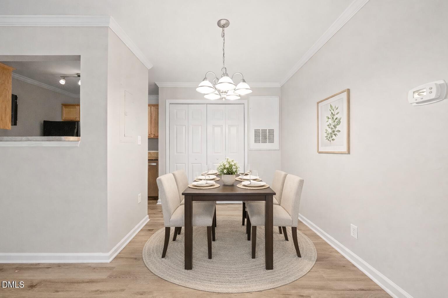 2304 Myron Drive, Unit 202 Raleigh, NC 27607 - Photo 6 of 31 Stylish and serene dining area