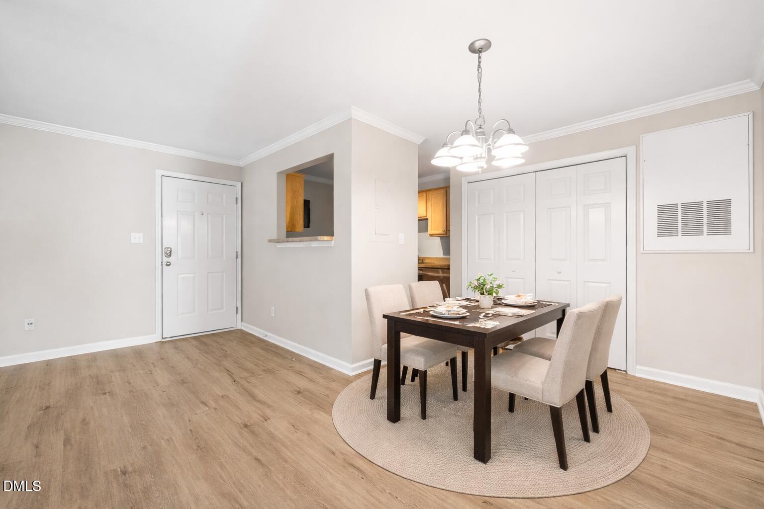 2304 Myron Drive, Unit 202 Raleigh, NC 27607 - Photo 8 of 31 Elegant dining area in neutral tones