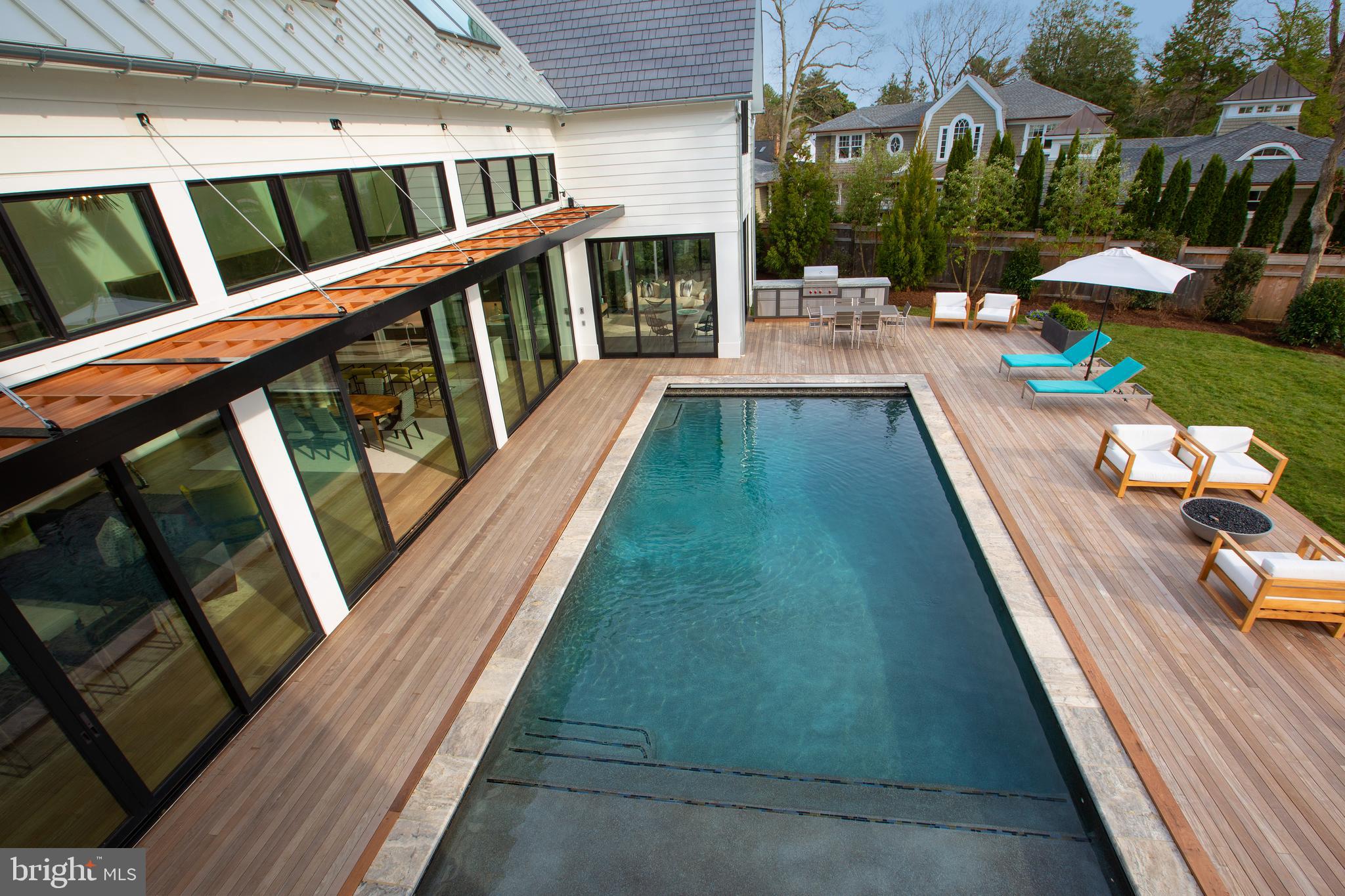 964 Melvin Road Annapolis, MD 21403 - Photo 19 of 30 Saltwater, Pebble Tec pool with sunshelf