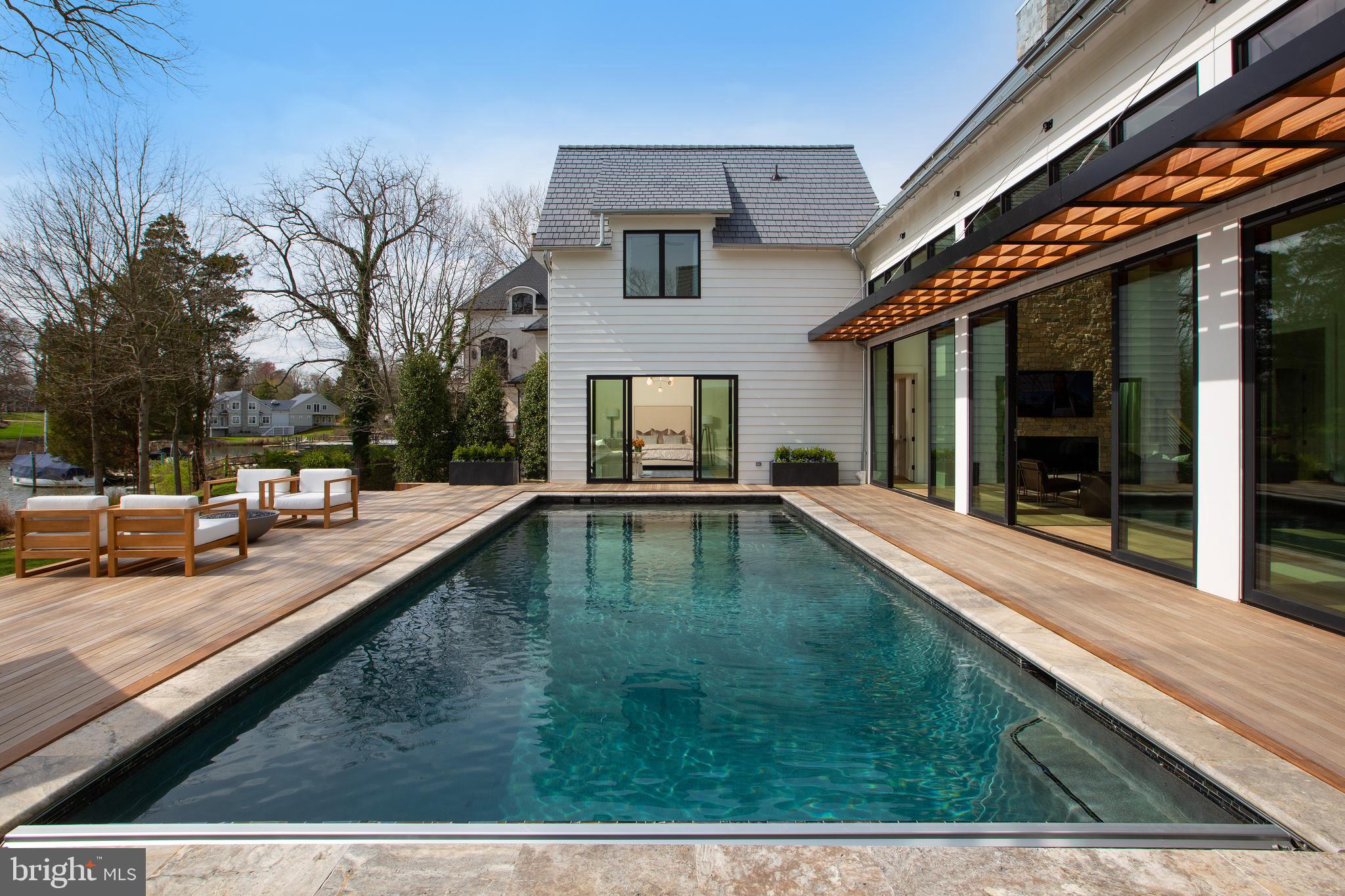 964 Melvin Road Annapolis, MD 21403 - Photo 21 of 30 View of pool with Primary's suite beyond