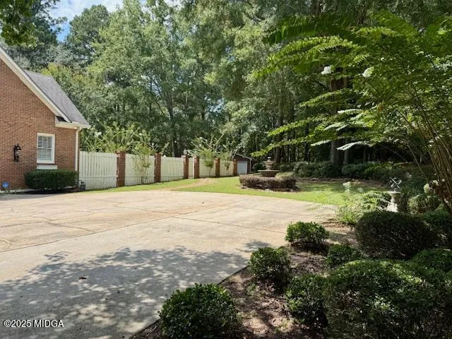 a house with trees in front of it