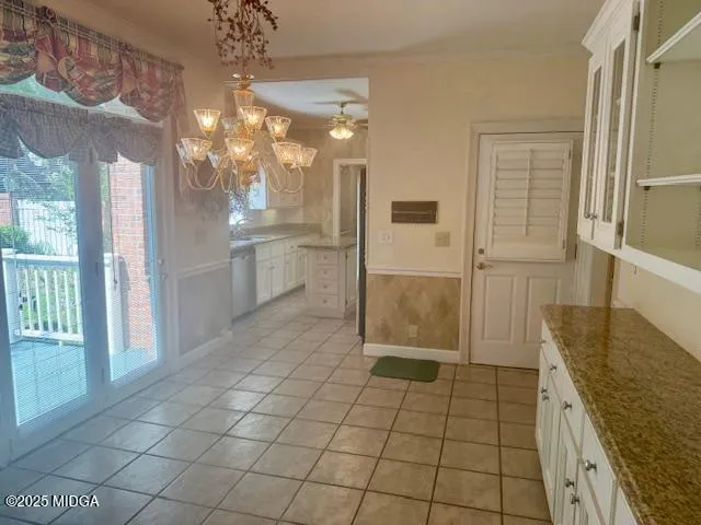 a bathroom with a shower and a sink