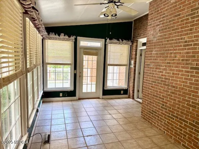 a view of a room with a large window