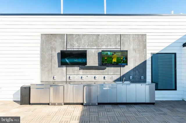 a view of a building with a small yard