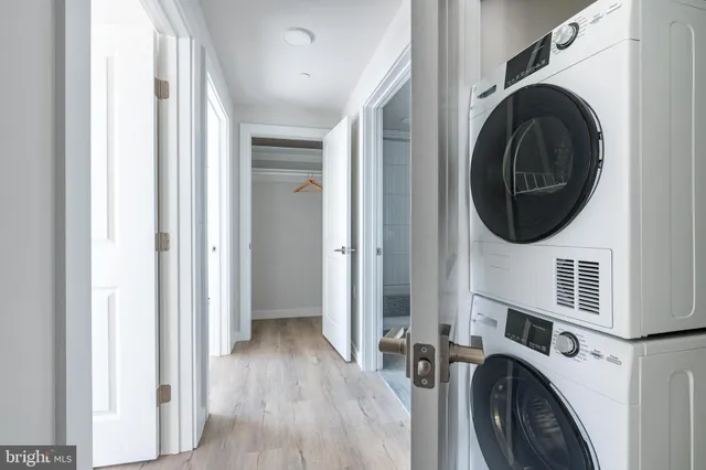 a bedroom with a bed and a closet in it