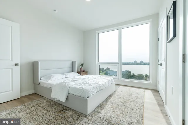 a bathroom with a sink a toilet and a shower