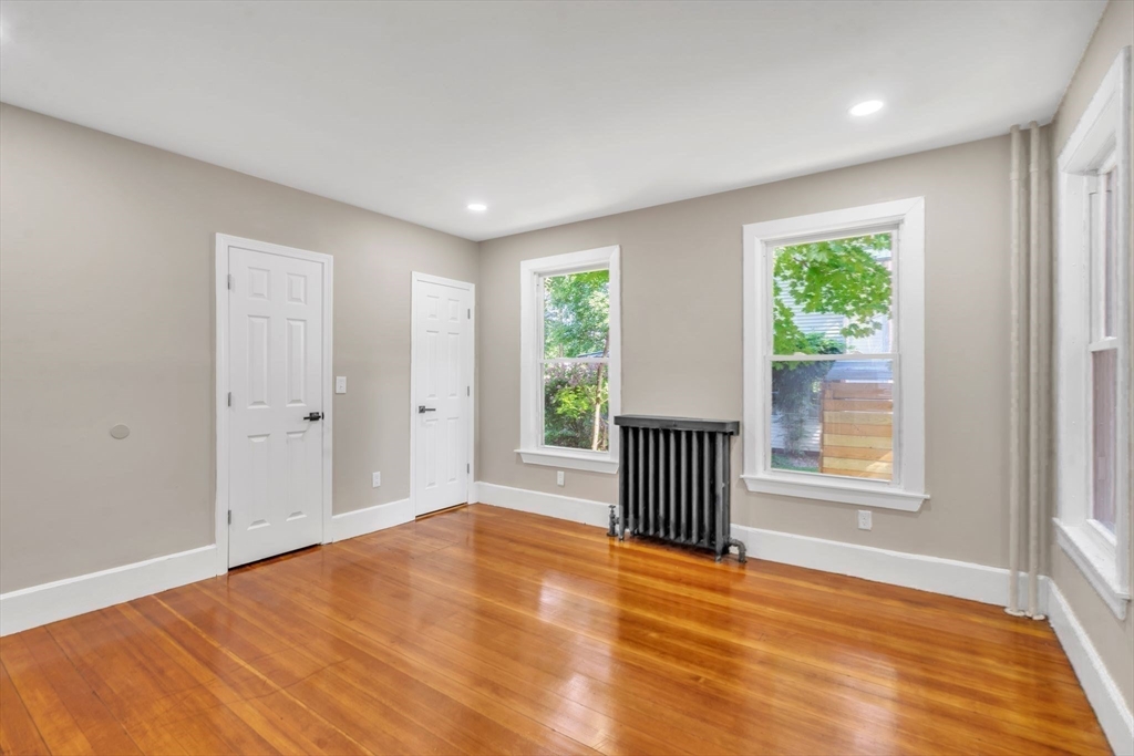 31 Park Street Northampton, MA 01062 - Photo 12 of 40 a view of a room with wooden floor and windows