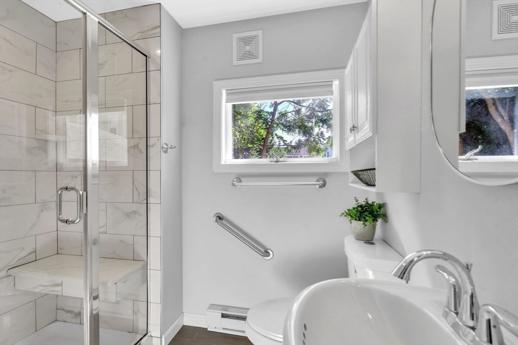 31 Park Street Northampton, MA 01062 - Photo 17 of 40 a bathroom with a sink and toilet
