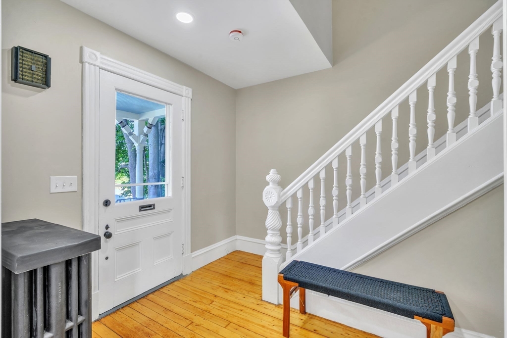31 Park Street Northampton, MA 01062 - Photo 18 of 40 a view of an entryway with wooden floor and staircase