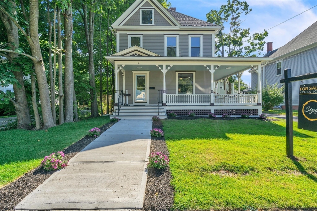 31 Park Street Northampton, MA 01062 - Photo 2 of 40 a front view of a house with yard