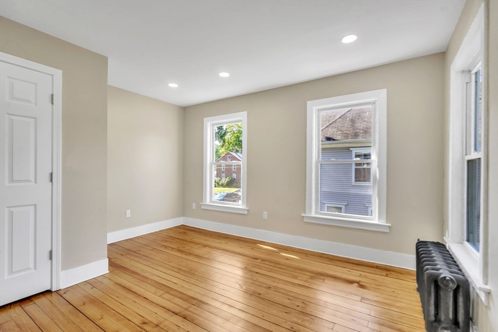 31 Park Street Northampton, MA 01062 - Photo 25 of 40 a view of empty room with wooden floor and fan