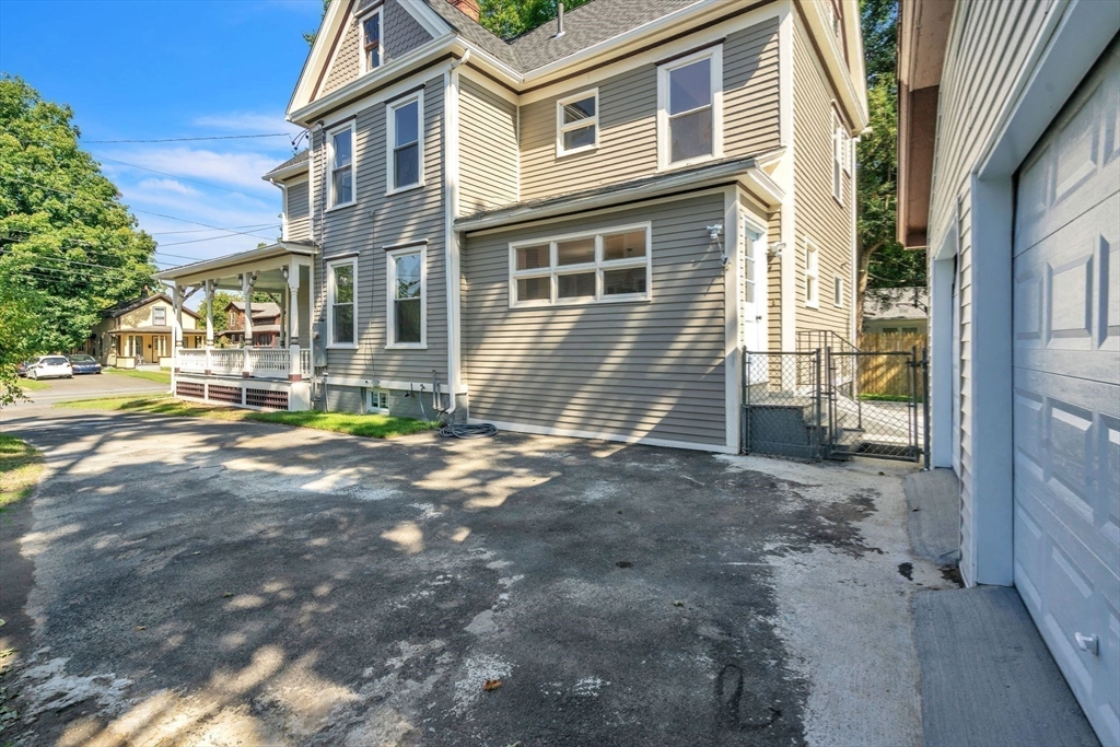 31 Park Street Northampton, MA 01062 - Photo 29 of 40 a view of a brick house with many windows