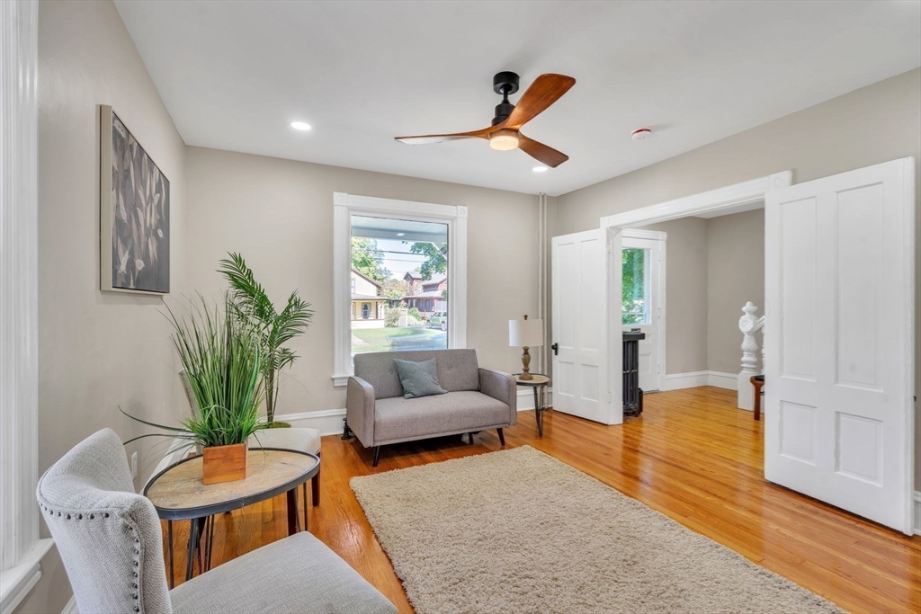 31 Park Street Northampton, MA 01062 - Photo 9 of 40 a living room with furniture and a potted plant