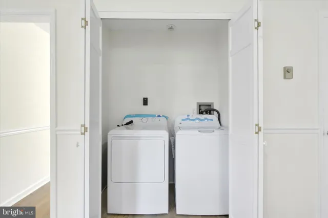 a utility room with dryer and washer
