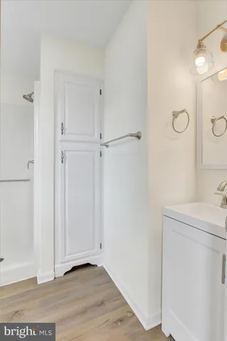 a view of a bathroom with a sink dryer and washer